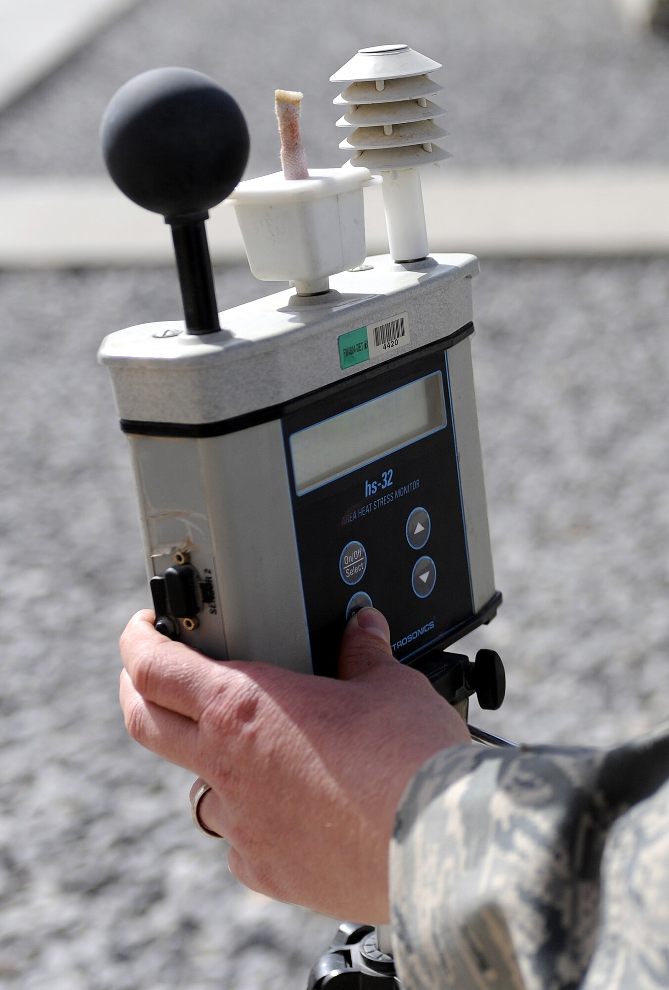 Tech. Sgt. Chad Brock takes an outdoor temperature reading April 11, 2011, at Kandahar Airfield, Afghanistan. The machine is slightly more complicated than a household thermometer; it is a computer designed to find the Wet Bulb Globe Temperature, which measures not just temperature, but overall physical stress created by weather conditions. A computer takes into account things like humidity, wind speed and radiant heat exposure. Sergeant Brock is a bioenvironmental engineering technician assigned to the 451st Expeditionary Air Wing. (U.S. Air Force photo/Senior Airman Willard E. Grande II)