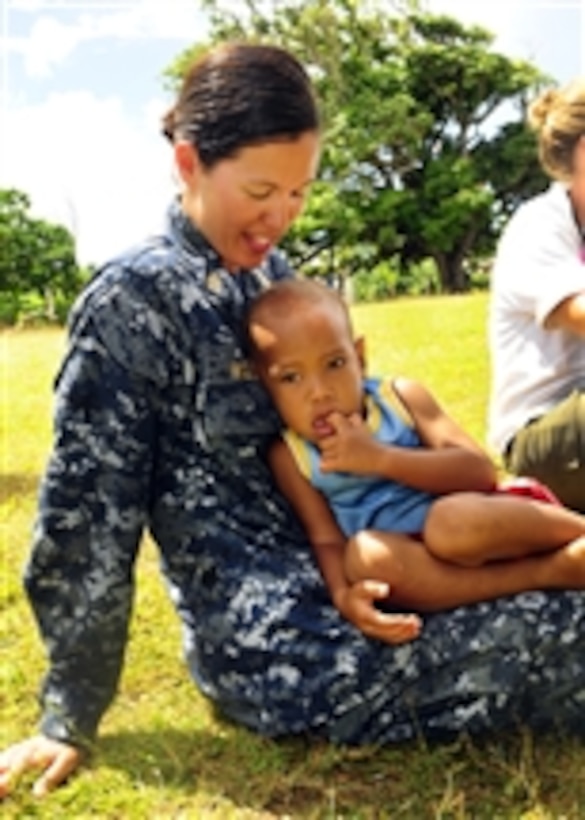 Senior Chief Petty Officer Anna Wood relaxes after a medical civil assistance program operation in support of Pacific Partnership 2011 in Hungga, Tonga, on April 15, 2011.  Tonga is the first of five Pacific island nations visited for Pacific Partnership 2011 including Vanuatu, Papua New Guinea, Timor-Leste, and the Federated States of Micronesia.  Pacific Partnership is a humanitarian assistance initiative, which promotes cooperation throughout the Pacific.  