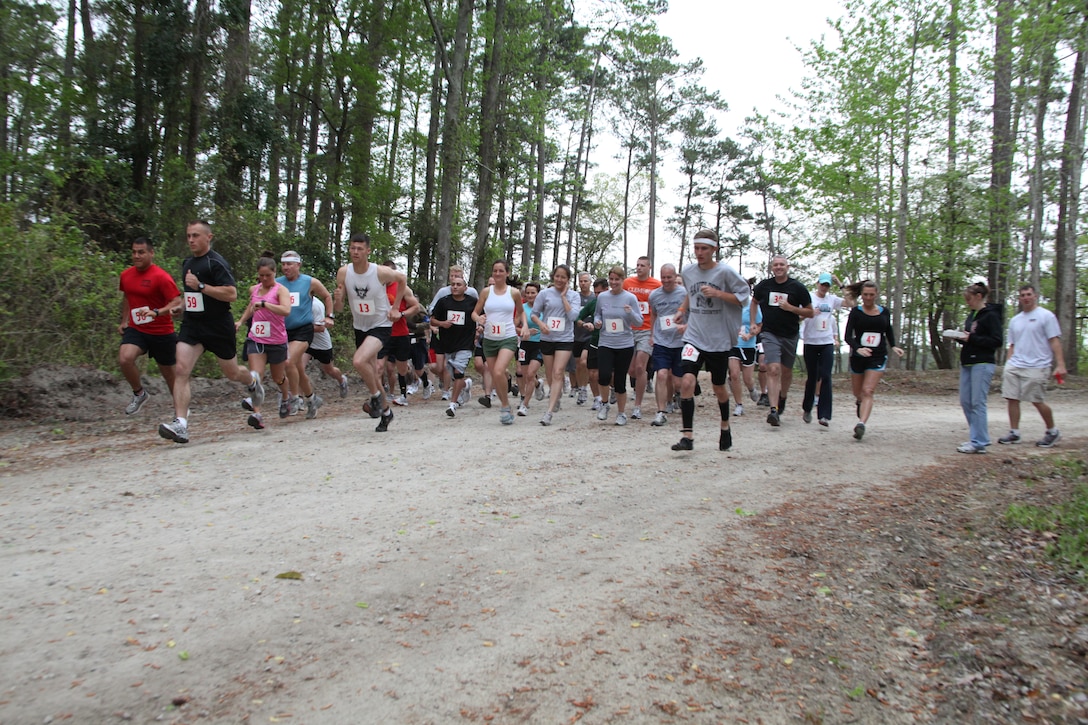 Nearly 50 runners begin the 2011 Piranha Pit Fun Run at Cherry Point April 14. The main portion of the course took participants through about three miles of the Piranha Pit’s backwoods trails and natural scenery.