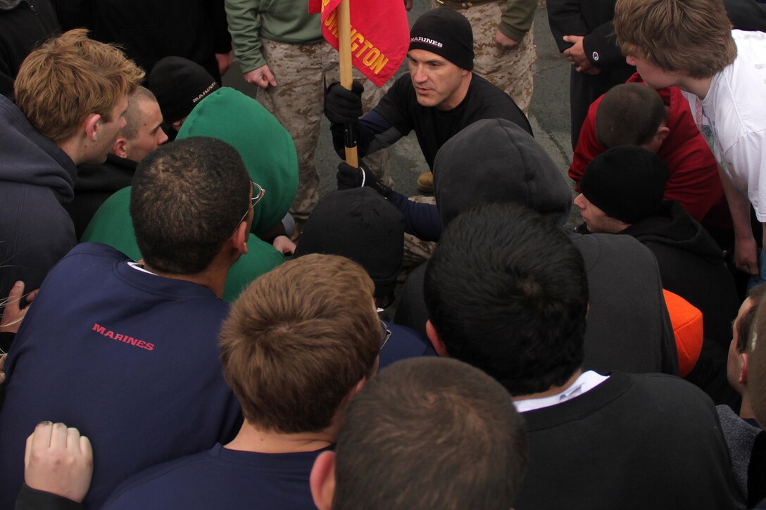 Gunnery Sgt. Michael Soucy, 38, from Biddeford, Maine, conducts a leadership talk to motivate Marine applicants during Recruiting Substation Bloomington's Family Day April 16. More than 100 poolees, family members and guests attended the function. For more photos of the event, visit www.facebook.com/rstwincities.