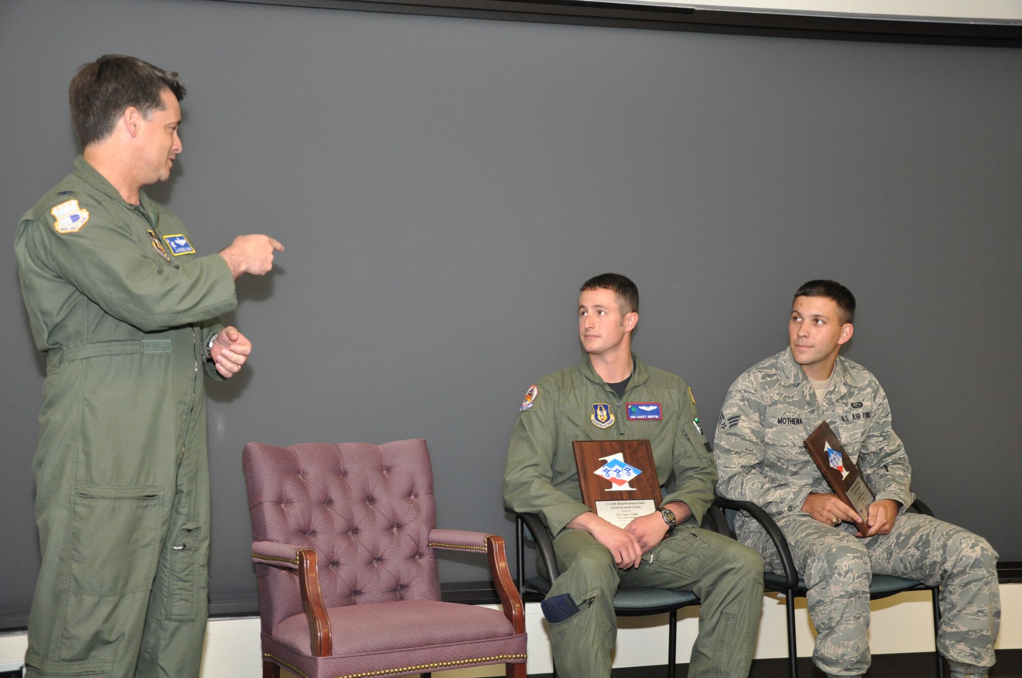 During the April Unit Training Assembly, two members of the 315th Airlift Wing were awarded the Diamond Sharp Award. Senior Airman Casey Griffin, 701st Airlift Squadron and Senior Airman Michael Mothena, 317th Airlift Squadron were both given the award by their First Sergeants to recognize outstanding service from January 2011-March 2011. (U.S. Air Force Photo/Tech. Sgt. Scott Mathews) 