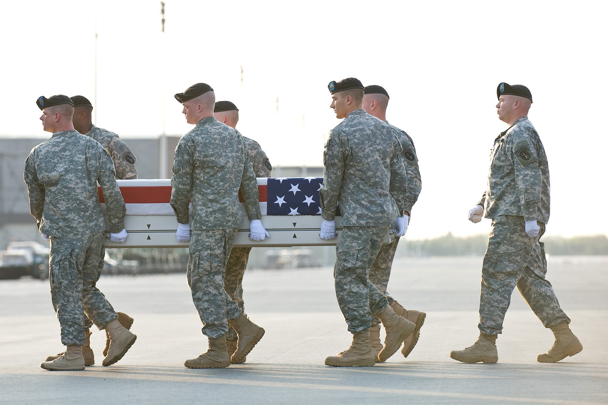 A U.S. Army carry team transfers the remains of Army Spc. Joseph B. Cemper, of Warrensburg, Mo., at Dover Air Force Base, Del., April 18, 2011. Cemper was assigned to the 101st Special Troop Battalion, 101st Sustainment Brigade, Fort Campbell, Ky. (U.S. Air Force photo/Roland Balik)