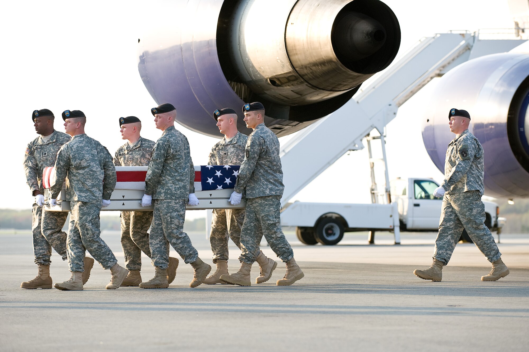 A U.S. Army carry team transfers the remains of Army Sgt. Linda L. Pierre, of Immokalee, Fla., at Dover Air Force Base, Del., April 18, 2011. Pierre was assigned to the 101st Special Troop Battalion, 101st Sustainment Brigade, Fort Campbell, Ky. (U.S. Air Force photo/Roland Balik)
