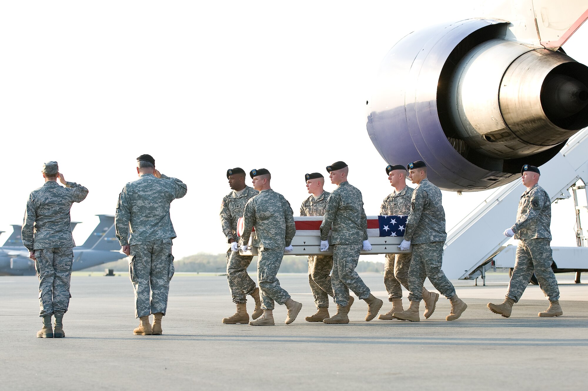 A U.S. Army carry team transfers the remains of Army Staff Sgt. Cynthia R. Taylor, of Columbus, Ga., at Dover Air Force Base, Del., April 18, 2011. Taylor was assigned to the 101st Special Troop Battalion, 101st Sustainment Brigade, Fort Campbell, Ky. (U.S. Air Force photo/Roland Balik)