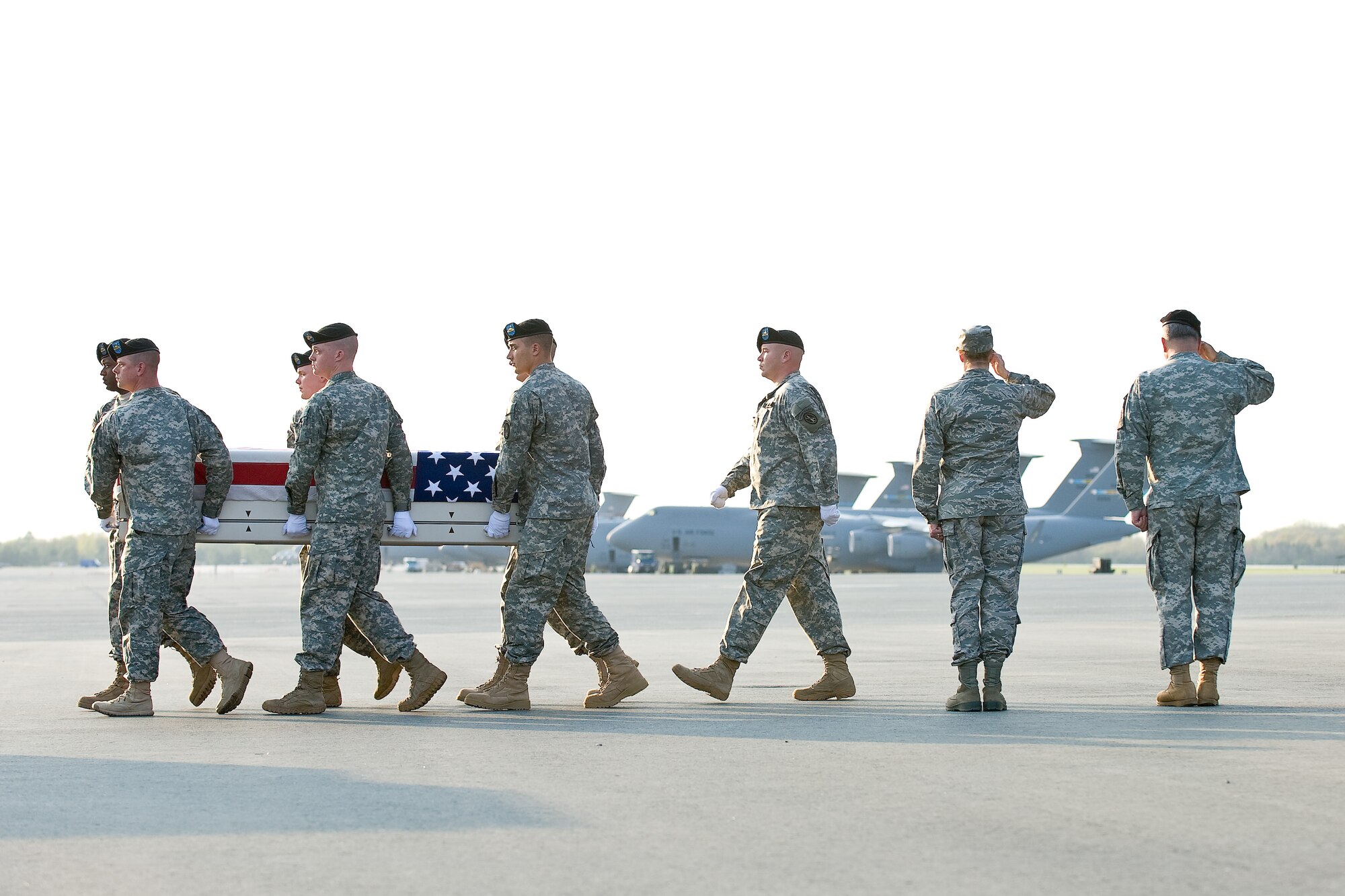 A U.S. Army carry team transfers the remains of Army Capt. Charles E. Ridgley Jr., of Baltimore, Md., at Dover Air Force Base, Del., April 18, 2011. Ridgley was assigned to the 17th Combat Support Battalion, Fort Richardson, Alaska. (U.S. Air Force photo/Roland Balik)