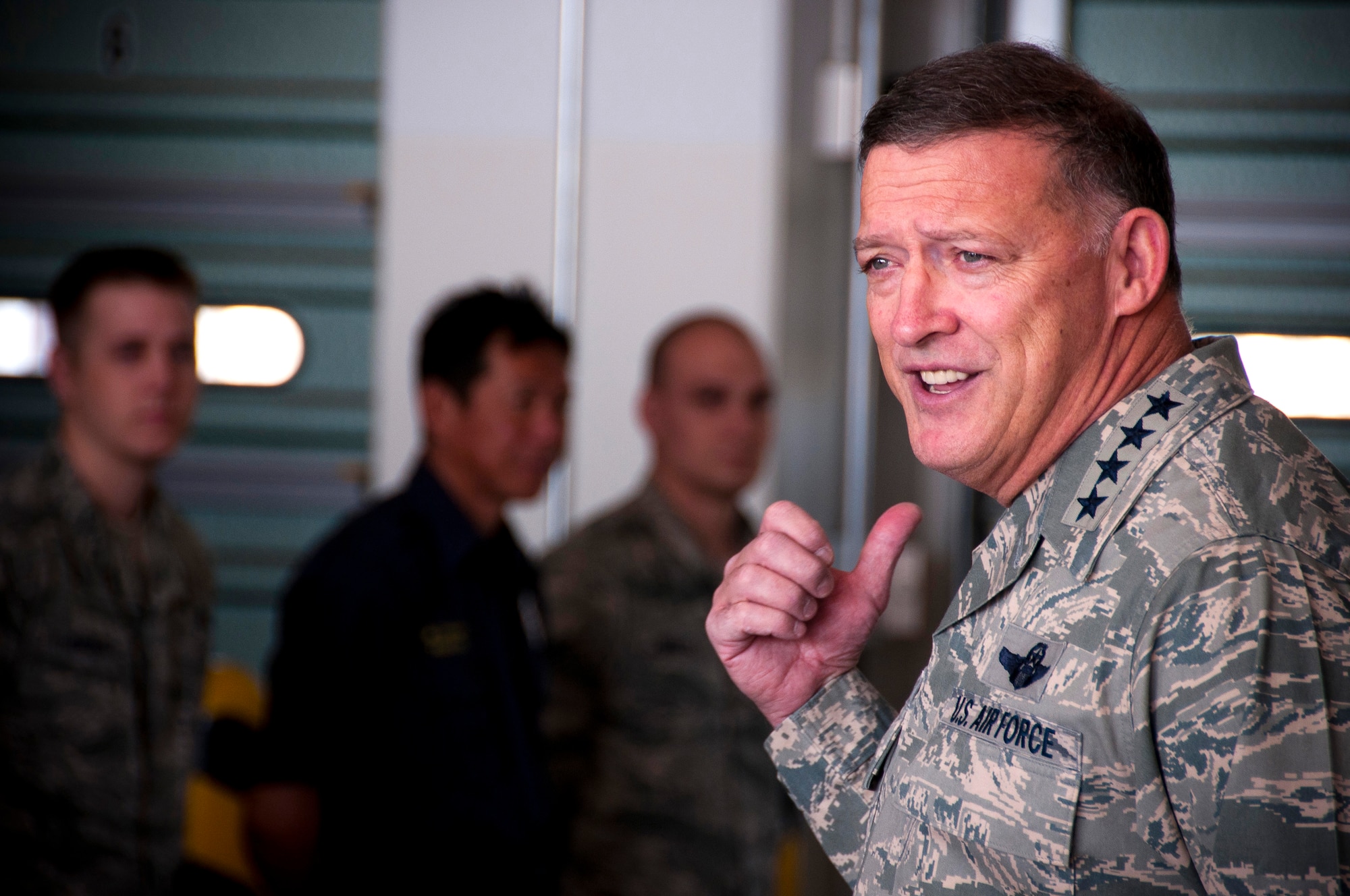 YOKOTA AIR BASE, Japan -- General Gary North, Pacific Air Forces commander, speaks with 374th Civil Engineer Squadron firefighters here April 17. General North visited Yokota AB to thank Airmen for their efforts in support of Operation Tomodachi. (U.S. Air Force photo/Staff Sgt. Chad C. Strohmeyer)