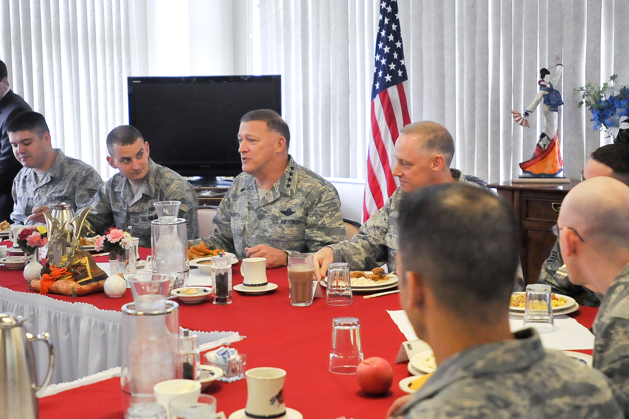 YOKOTA AIR BASE, Japan -- General Gary North, Pacific Air Forces commander, has lunch with Airmen at the Samurai Dining Cafe here April 18. General North visited Yokota Air Base to thank Airmen for their support in Operation Tomodachi. (U.S. Air Force photo/Airman 1st Class Krystal M. Garrett)