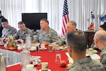 YOKOTA AIR BASE, Japan -- General Gary North, Pacific Air Forces commander, has lunch with Airmen at the Samurai Dining Cafe here April 18. General North visited Yokota Air Base to thank Airmen for their support in Operation Tomodachi. (U.S. Air Force photo/Airman 1st Class Krystal M. Garrett)