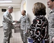 YOKOTA AIR BASE, Japan -- Senior Master Sgt. Rabin Ramsook, 374th Force Support Squadron, greets Gen. Gary North, Pacific Air Forces commander, during a tour of Yokota Air Base, April 18. General North visited Yokota Air Base to thank Airmen for their support in Operation Tomodachi. (U.S. Air Force photo/Airman 1st Class Krystal M. Garrett) 