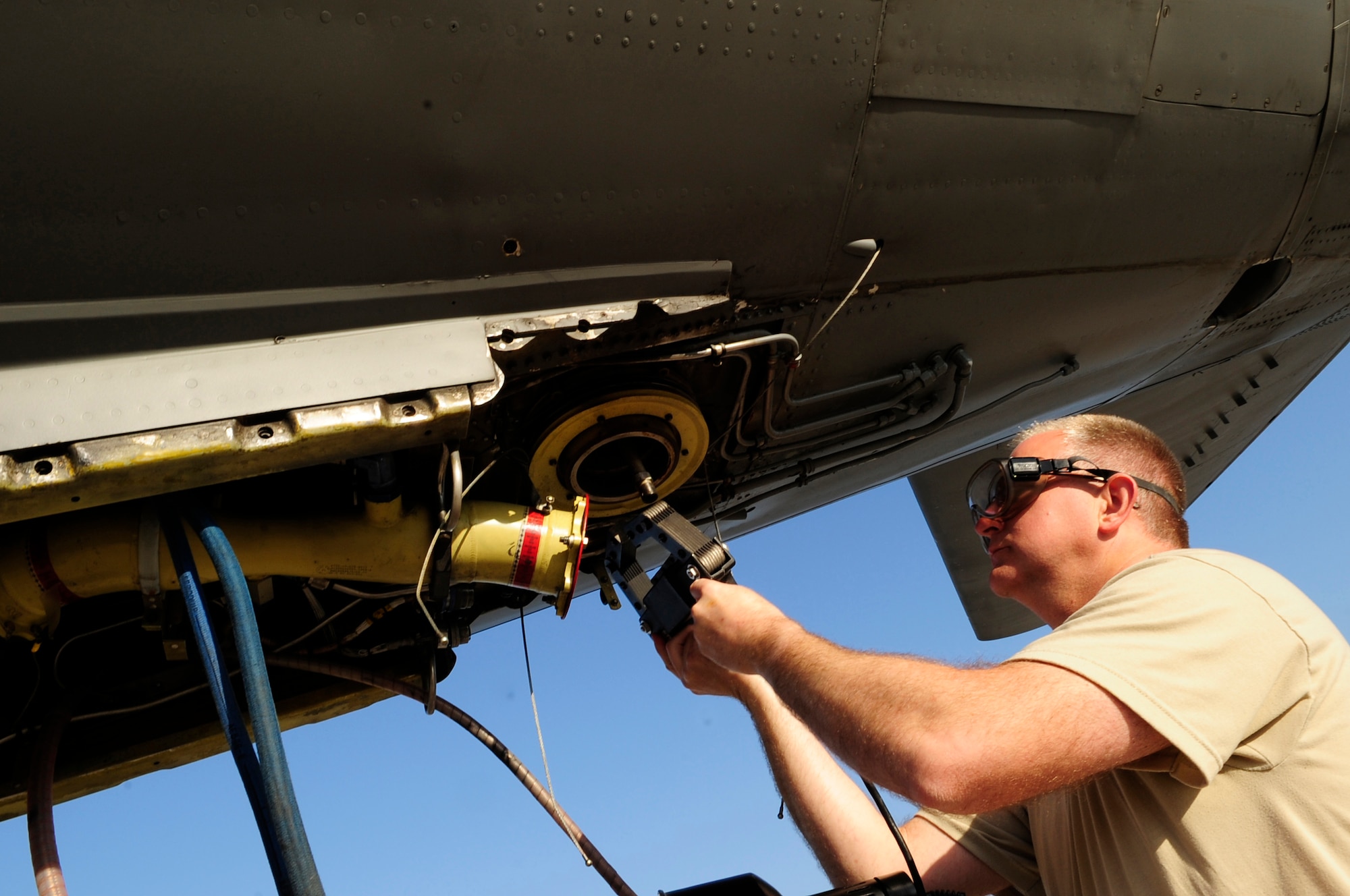 Tech. Sgt. David Sparkman magnetizes a boom strut bolt on a KC-135 Stratotanker April 12, 2011, during a magnetic particle inspection.  Sergeant Sparkman is from the Pennsylvania Air National Guard’s 171st Air Refueling Wing and is deployed with the 313th Air Expeditionary Wing at an air base in Western Europe supporting Operation Unified Protector, a NATO-led mission in Libya, to protect civilians and civilian-populated areas under threat of attack. The 313th AEW provides aerial refueling to U.S. and coalition aircraft using KC-135 Stratotankers and KC-10 Extenders. (U.S. Air Force photo/Senior Airman Ethan Morgan)