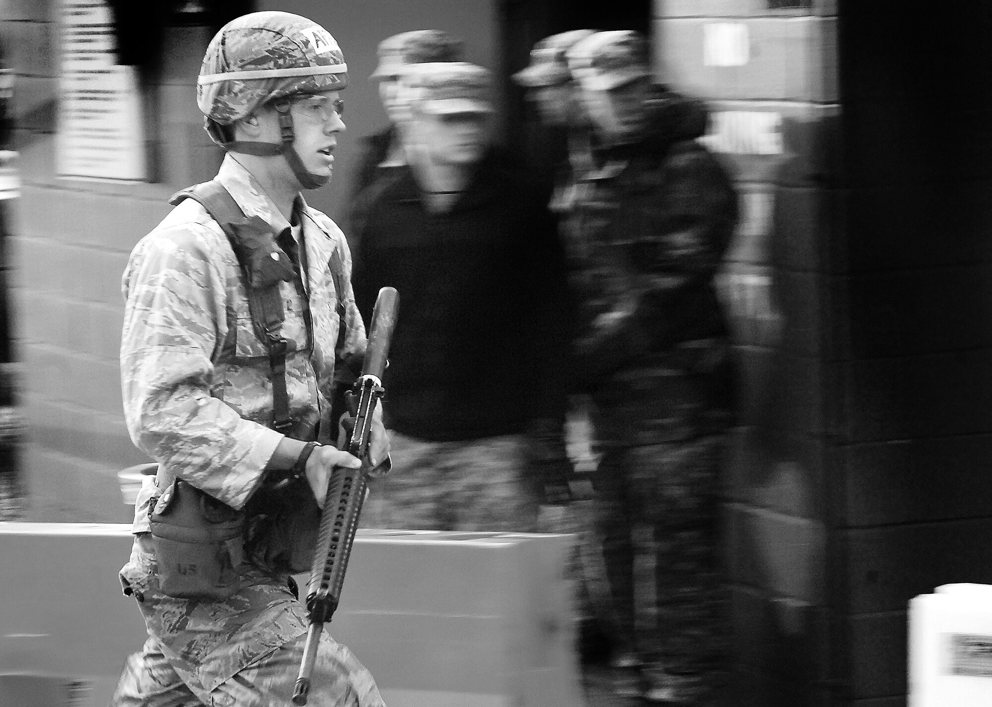 Cadet 2nd Class Zac Blasdel races to his fighting position during the combat shooting portion of the Sandhurst Competition Saturday, April 16, 2011 at the U.S. Military Academy, N.Y.  The competition requires each team to perform a series of challenging military tasks along a 7-mile route, and compete in a marksmanship competition.  The team only had a rough idea of what to train for as most of the challenges were kept secret until the day of the event.  (U.S. Air Force photo/Staff Sgt. Raymond Hoy)