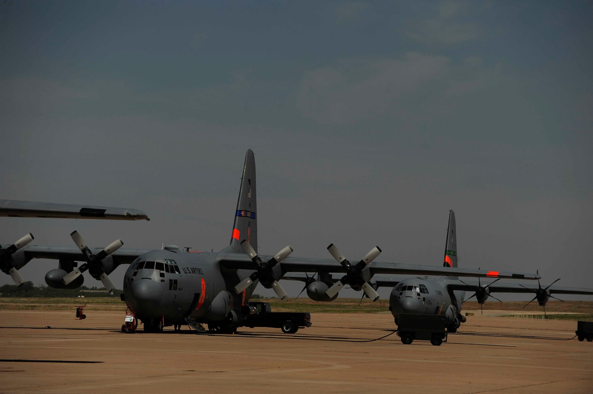 Airmen from California Air National Guard's 146th Airlift Wing, North Carolina Air National Guard's 145th Airlift Wing and Wyoming Air National Guard's 153rd Airlift Wing gather at Dyess Air Force Base, Texas to prepare for wildfire fighting operations, April 18, 2011.  The Airmen maintain and operate the Modular Airborne Firefighting System (MAFFS) housed aboard a C-130 Hercules which is capable of dispensing 3,000 gallons of water or fire retardant in under 5 seconds.  The wildfires have spread across various parts of Texas and have burned more than 1,000 square miles of land.  (U.S. Air Force Photo/Staff Sgt. Eric Harris)
