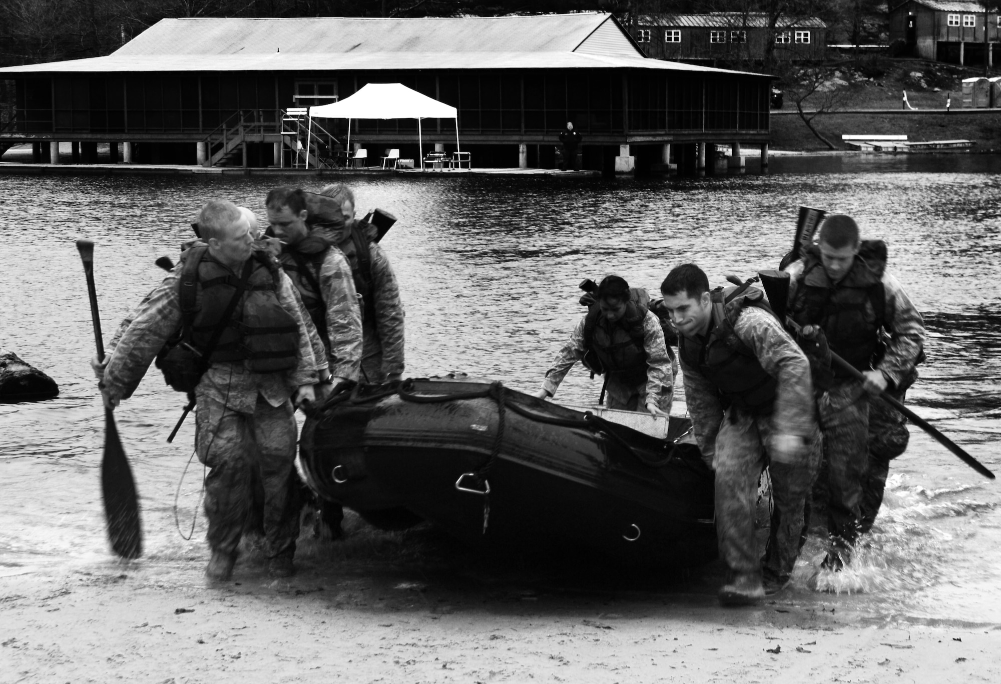 The Air Force Sandhurst team pull their boat from the water following the water portion of the Sandhurst Competition Saturday, April 16, 2011 at the U.S. Military Academy, N.Y.  The competition requires each team to perform a series of challenging military tasks along a 7-mile route, and compete in a marksmanship competition.  The team only had a rough idea of what to train for as most of the challenges were kept secret until the day of the event.  (U.S. Air Force photo/Staff Sgt. Raymond Hoy)