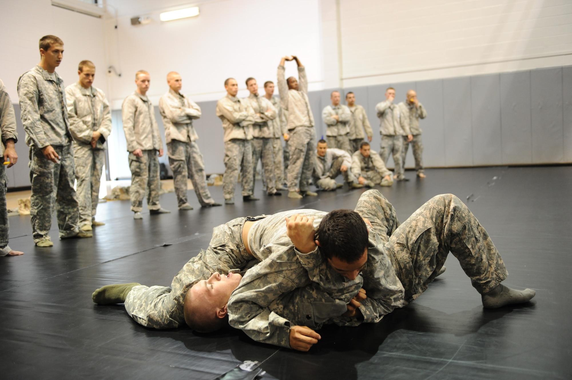 Tactial Air Control Party students test their new combatives skills on each other at Hurlburt Field, Fla., March 31, 2011. The TACPs adopted the new curriculum as part of the Air Force Combatives Program, initated January 2008. (U.S. Air Force photo by Airman 1st Class Caitlin O'Neil-McKeown/RELEASED) 