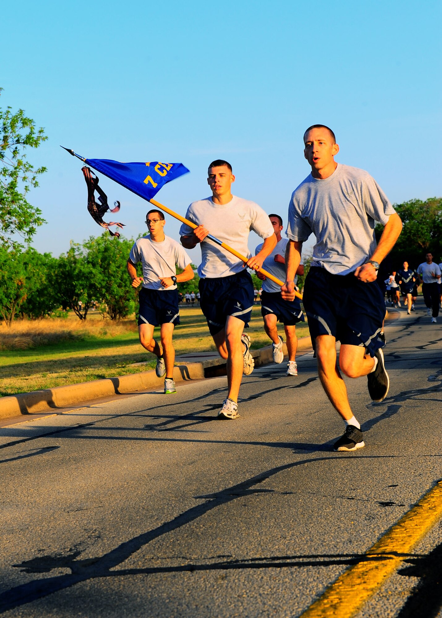 DYESS AIR FORCE BASE, Texas-- Dyess Airmen participate in a Warrior Fun Run April 18 near the traffic circle here. The run kicked off a 30-day mad dash to prepare for the Operational Readiness Inspection. An ORI tests a wing’s ability to support a major combat operations. (U.S. Air Force photo/ Airman 1st Class Courtney Moses) 