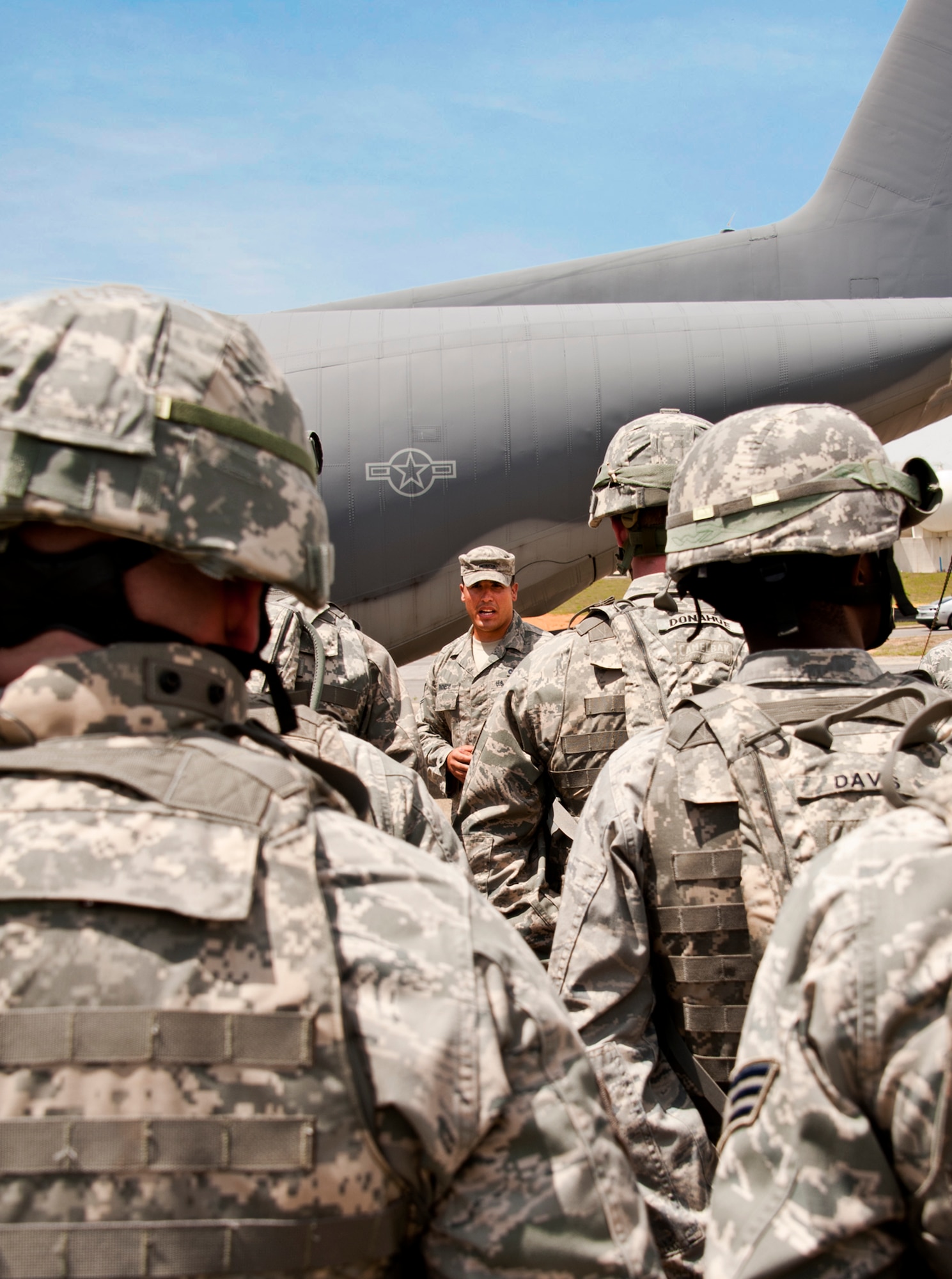 Staff Sgt. Pacheco, 96th Ground Combat Training Squadron, briefs security forces Airmen on the procedures required when guarding an aircraft during a Fly Away Security Team training session April 14 at Eglin Air Force Base.  The course, taught by 96th Ground Combat Training Squadron instructors, brought together security forces Airmen from all over the U.S. to learn how to protect aircraft and handle potential hostile situations.  (US. Air Force photo/Samuel King Jr.)