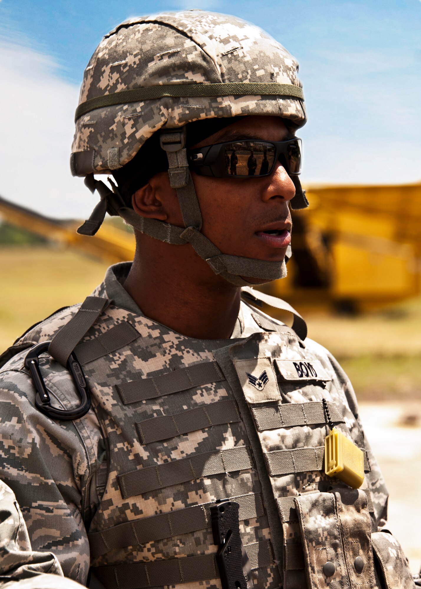 Senior Airman Vernon Boyd, 17th Security Forces Squadron, goes over lessons learned from the last scenario with teammates during Fly Away Security Team training April 14 at Eglin Air Force Base.  The course, taught by 96th Ground Combat Training Squadron instructors, brought together security forces Airmen from all over the U.S. to learn how to protect aircraft and handle potential hostile situations.  (US. Air Force photo/Samuel King Jr.)