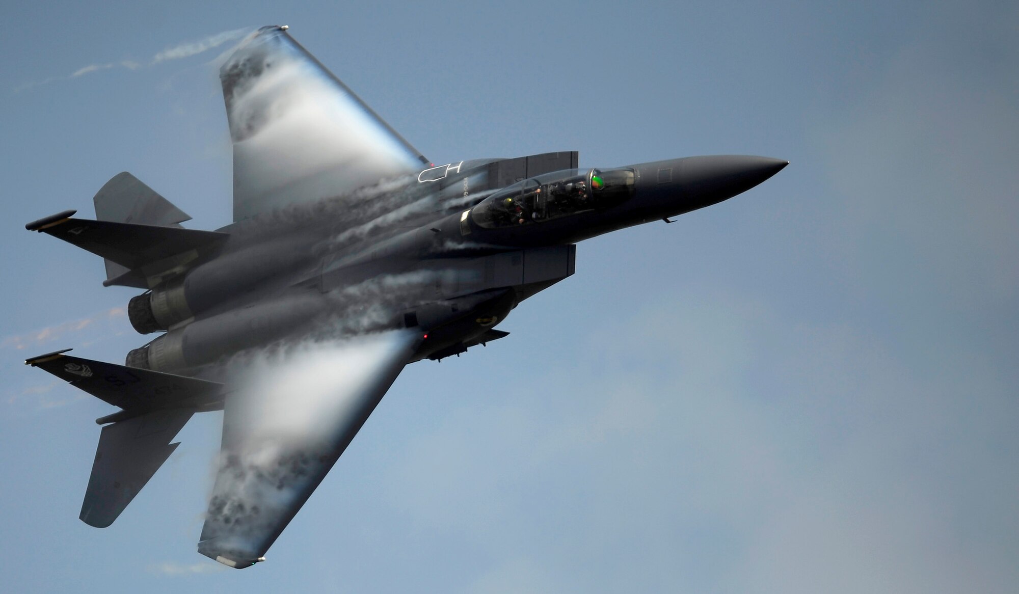 An F-15E Strike Eagle pilot demonstrates the aircraft's maneuverability April 9, 2011, during the Charleston Air Expo at Joint Base Charleston S.C. The F-15E is a multirole fighter capable of air-to-surface and air-to-air combat. (U.S. Air Force photo/Airman 1st Class James Richardson) 