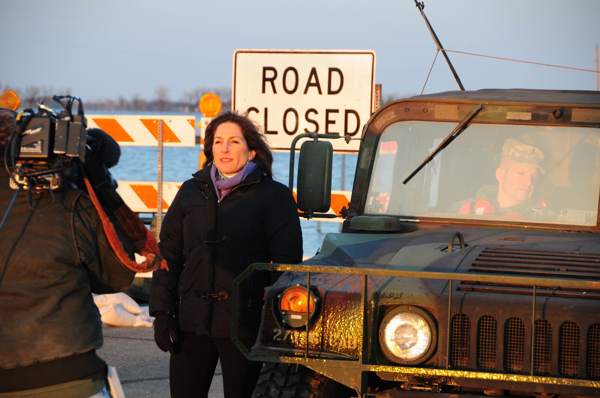 An ABC news crew films Good Morning America's story on the flooding around the city of Oslo, Minn. April 14, 2011.  From along flooded-over Minnesota Highway 1.  Barbara Pinto, a news correspondent for ABC, reported about Red River Valley flooding that has made Oslo into an island.  (U.S. Air Force photo by Tech. Sgt. Brett R. Ewald)