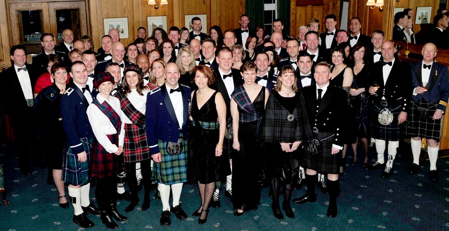 RAF Mildenhall, England -- Members and guests of the British-American Committee celebrate together during Burns Night at Middleton Hall on January 29, 2011. This is one of the social events that the committee hosts each year, bringing both communities together for a culturally rich experience. (U.S. Air Force photo/Senior Airman Ethan Morgan)