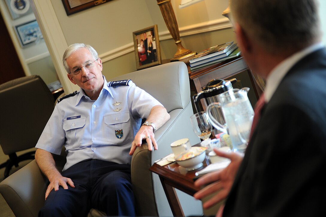 Deputy Defense Secretary William J. Lynn III meets with Air Force Gen. Douglas Fraser, U.S. Southern Command commander, during a visit to Southcom in Miami, April 18, 2011. 

