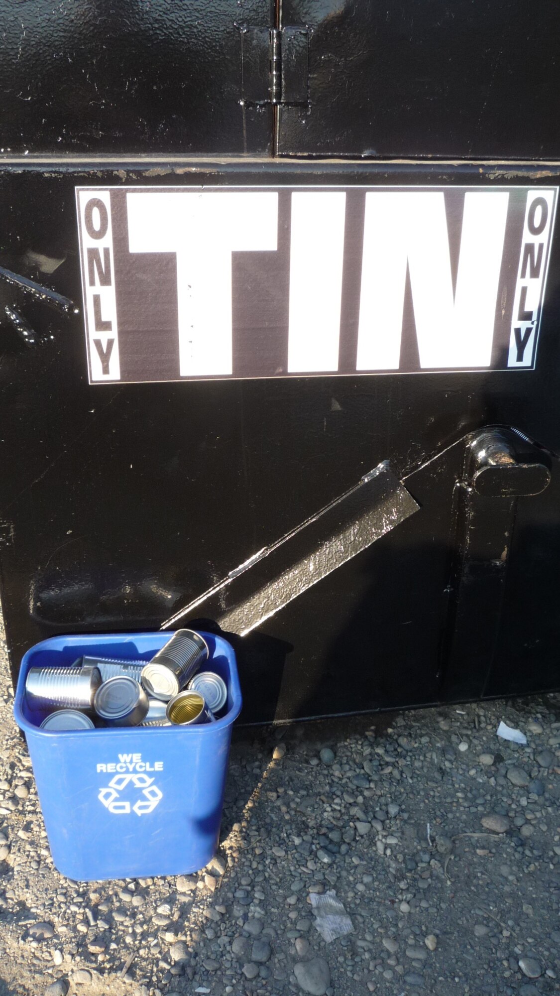 Tin Cans, or food cans, should be placed in the black recycling dumpsters.  Remove all paper labels and be sure cans and lids are rinsed clean.  Do not place anything else in this bin.  Aerosol cans are not recyclable. (Courtesy photo)