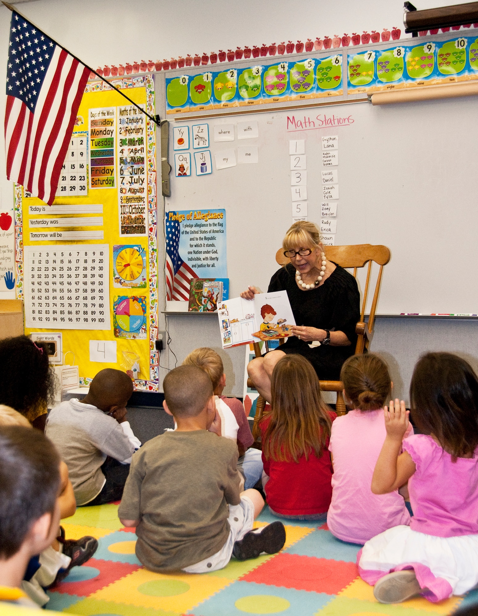 Florida's First Lady, Ann Scott, reads to students at Eglin Elementary April 19.  Mrs. Scott, also a former military spouse, read to kindergarten classes and made a point of visiting with the school dietitian and with the PE class.  Mrs. Scott, an avid reader, visits with students across the state, encouraging them to read and to write.  (Air Force photo/Minty Knighton)
