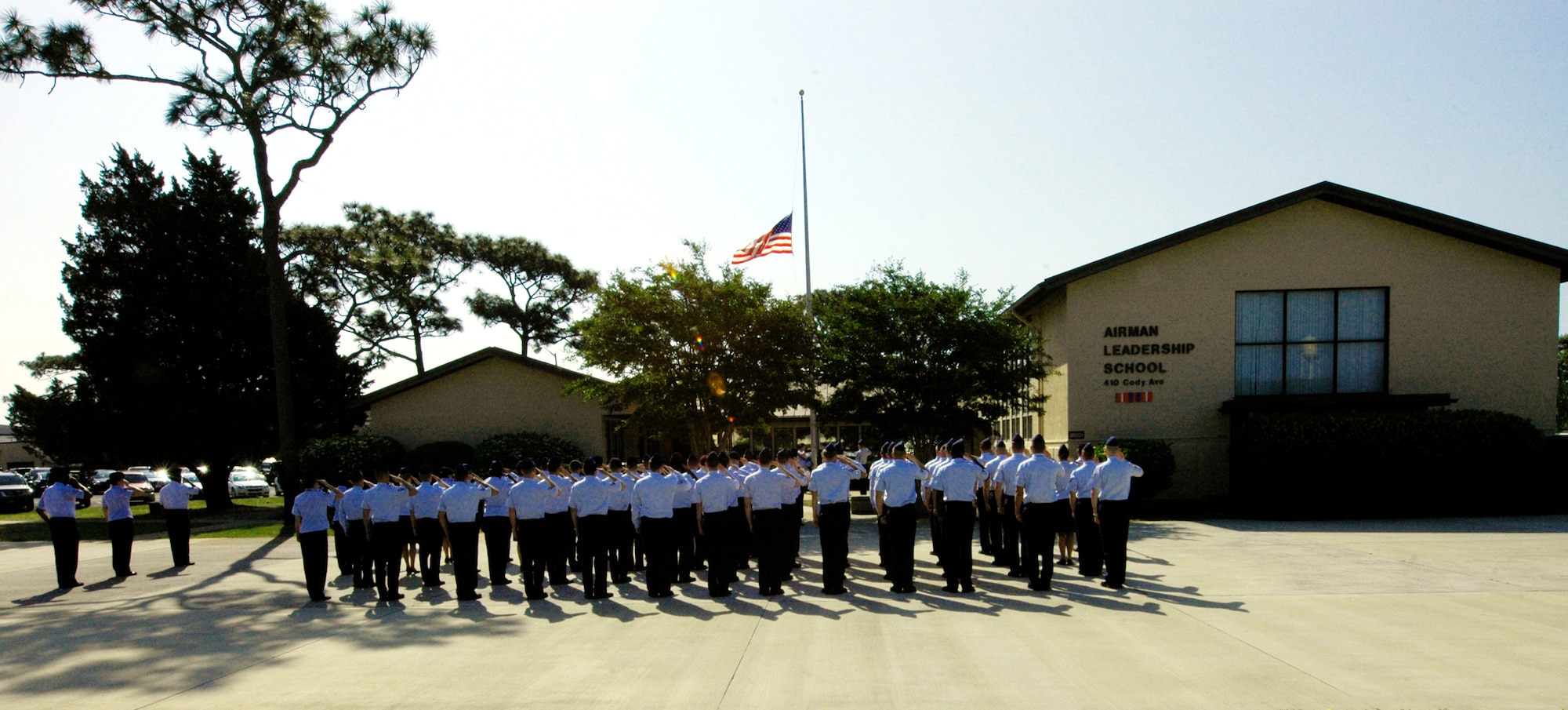 Airman Leadership class 11E salutes  during an ALS memorial ceremony for Airman 1st Class John Vincent, April 18, 2011 at Hurlburt Field, Florida.    Airman Vincent was killed by lightning 15 years ago while working on the flight line here. Hurlburt Field's ALS is named after Airman Vincent.  (U.S. Air Force photo by Senior Airman David Salanitri/Released) 


