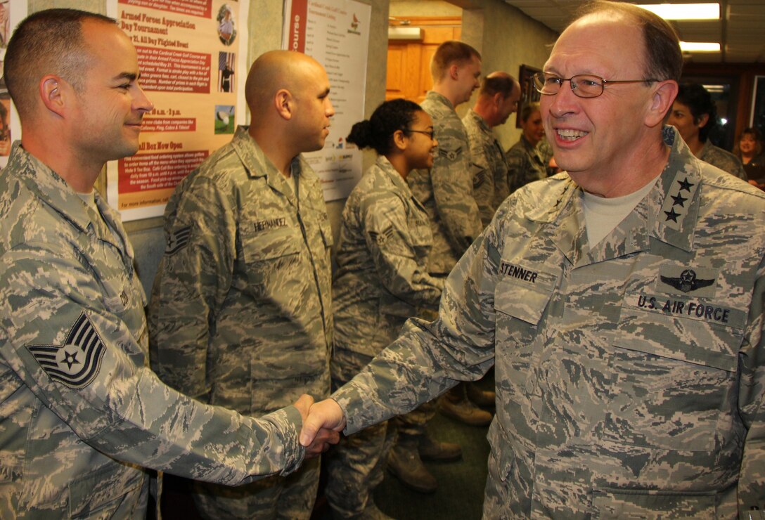 Lt. Gen. Charles  E. Stenner, Jr., commander of U.S. Air Force Reserve Command, shakes hands  with Tech. Sgt. Shannon Cook, before having breakfast with a small group of 932nd Airlift Wing reservists.  During his visit, General Stenner met with 932nd AW leadership and held a town hall meeting for reservists at the Scott Air Force Base theater.  (U.S. Air Force photo/Tech. Sgt. Dan Oliver)
