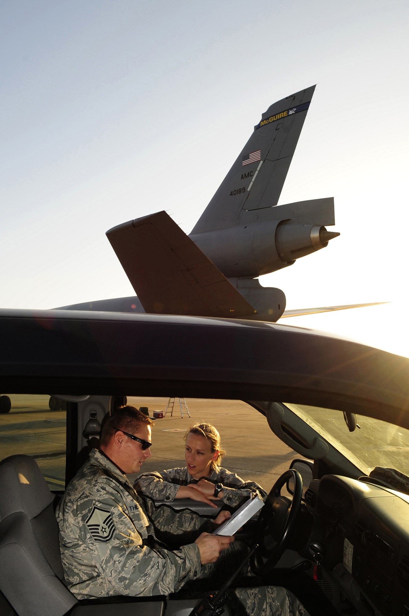 WESTERN EUROPE -- Master Sgt. David Theisen, KC-10 Extender production superintendent and Capt. Lyndsey Ballinger, KC-10 Extender Maintenance officer in charge. Both are deployed with the 313th Air Expeditionary Wing from the 349th Air Mobility Wing. (U.S. Air Force photo/Senior Airman Ethan Morgan/released)
