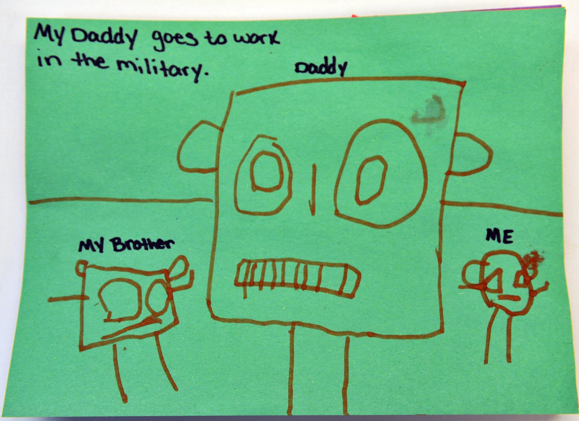 Children at the Cannon Air Force Base, N.M., Child Development Center drew pictures expressing what it means to be a military child, read books, sang songs, and participated in other activities to celebrate being military children throughout the month of April.  (courtesy photo) (RELEASED)