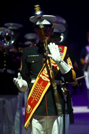 LAS VEGAS -- A member of the U.S. Marines Air Combat Band marches during the performance during the International Tattoo at the Thomas & Mack Center April 15. The international tattoo is a show celebrating the contribution of America's armed forces. (U.S. Air Force photo by Senior Airman Brett Clashman)
