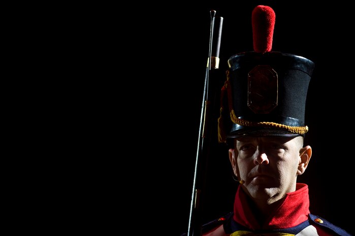 LAS VEGAS -- A member of the U.S. Marines Air Combat Band marches during the International Tattoo at the Thomas & Mack Center April 15. The international tattoo is a show celebrating the contribution of America's armed forces. (U.S. Air Force photo by Senior Airman Brett Clashman)