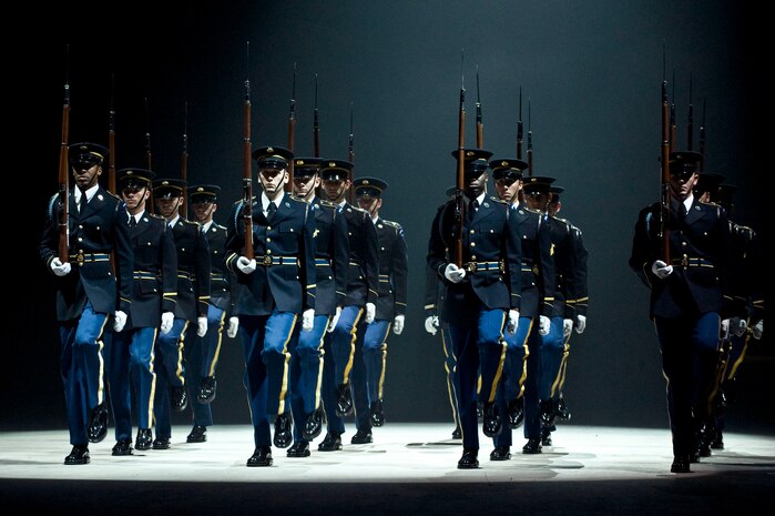 LAS VEGAS --  U.S. Army ?Old Guard? Drill Team march onto the performance floor during the International Tattoo at the Thomas & Mack Center, April 15. The international tattoo is a show celebrating the contribution of America's armed forces. (U.S. Air Force photo by Airman 1st Class Matthew Lancaster)