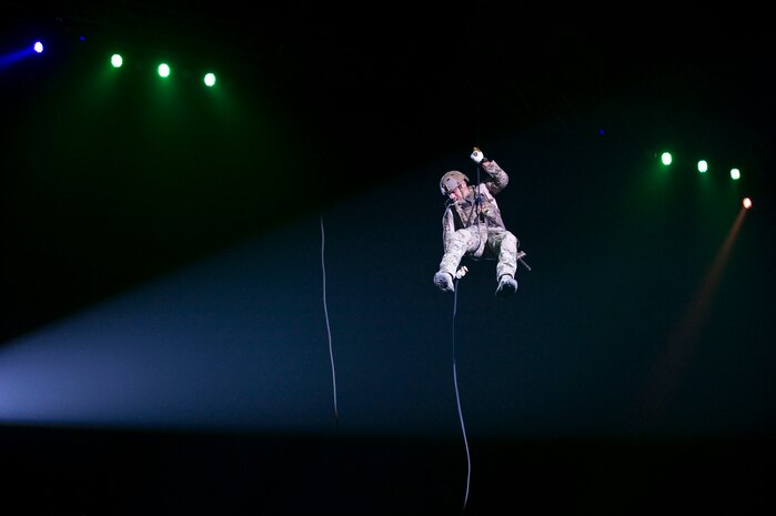 LAS VEGAS -- A pararescueman, from the 58th Rescue Squadron Nellis Air Force Base, Nev., rappels from the rafters during the International Tattoo at the Thomas & Mack Center, April 15. The international tattoo is a show celebrating the contribution of America's armed forces. (U.S. Air Force photo by Airman 1st Class Matthew Lancaster)