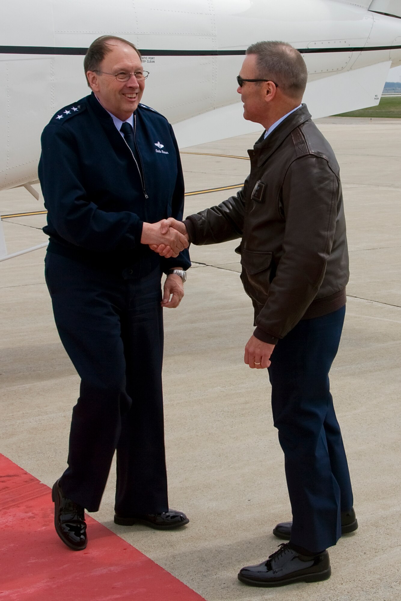 GRISSOM AIR RESERVE BASE, Ind. -- Lt. Gen. Charles E. Stenner, Jr., Chief of Air Force Reserve and Air Force Reserve Command commander, is greeted by Col. William T. "Tim" Cahoon, 434th Air Refueling Wing commander, upon his arrival here April 18. General Stenner, who was touring several AFRC units throughout the Midwest, met with local civic leaders and Colonel Cahoon before holding a town hall meeting with base personnel. (U.S. Air Force photo/Tech. Sgt. Mark R. W. Orders-Woempner)
