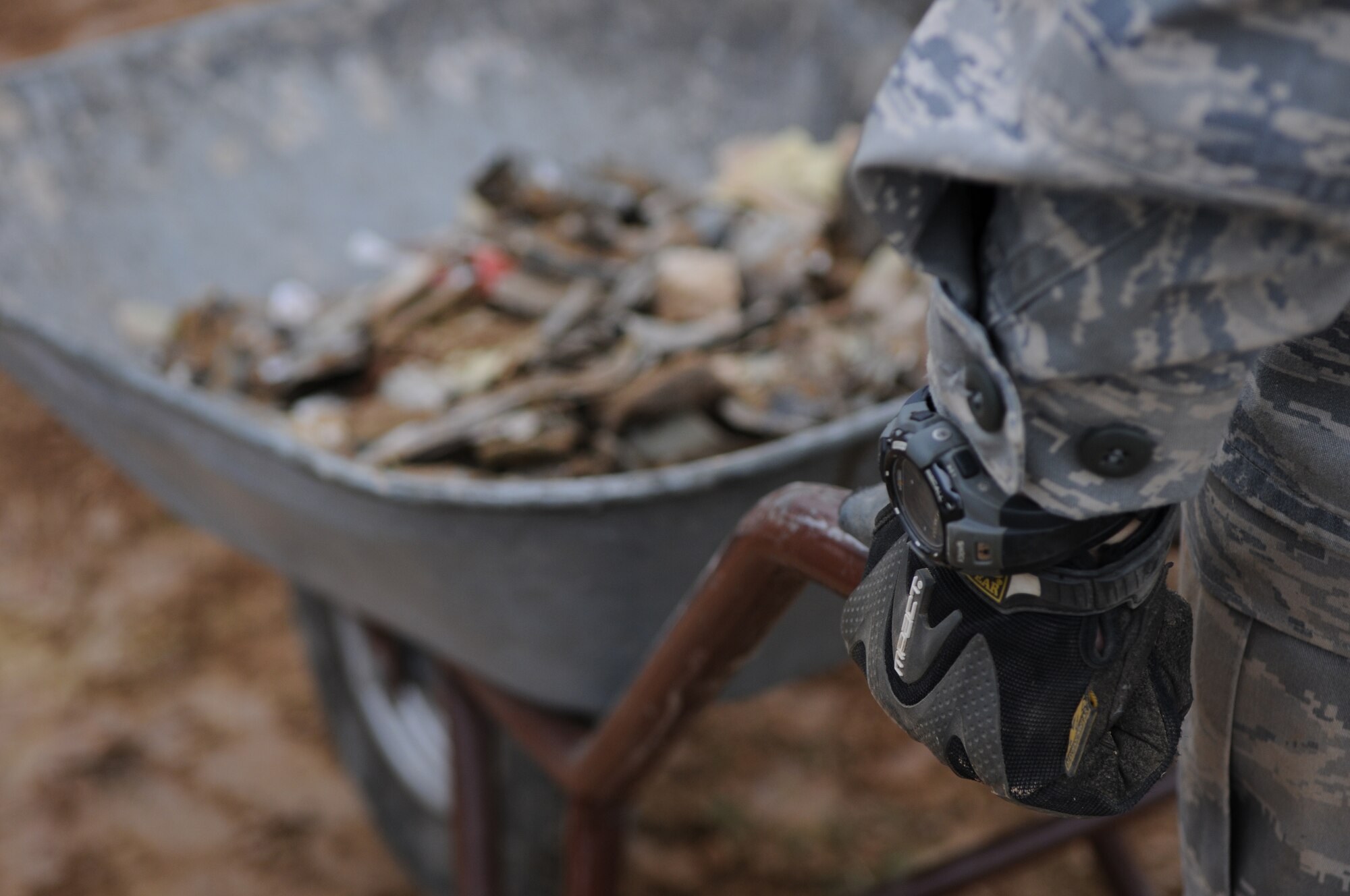 SPANGDAHLEM AIR BASE, Germany – A 52nd Civil Engineer Squadron Airman clears debris from the crash site of an Air Force A-10 Thunderbolt II near Laufeld, Germany, April 14. The aircraft crashed April 1 in a field outside Laufeld, a town north of the city of Wittlich. The pilot, Lt. Col. Scott Hurrelbrink, 81st Fighter Squadron, here was treated for injuries at the Krankenhaus der Barmherzigen Bruder, and no one else was injured due to the mishap. (U.S. Air Force photo/Airman 1st Class Matthew B. Fredericks)