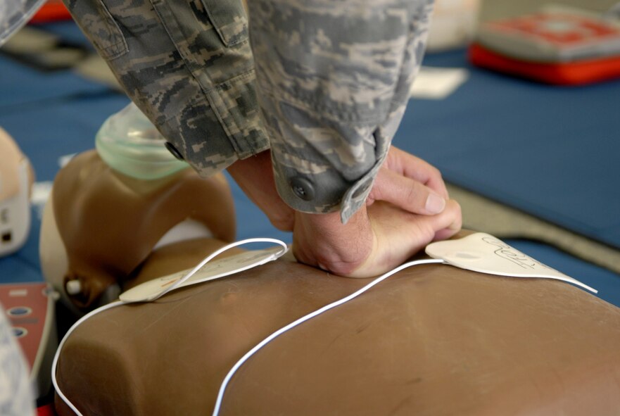 A student of a Heartsaver class practices the new American Heart Association CPR method of Circulation-Airway-Breathing, or CAB, here on Kadena Air Base, April 15. The AHA released the new CPR method in Nov. 2010. (U.S. Air Force photo/Airman 1st Class Tara A. Williamson)