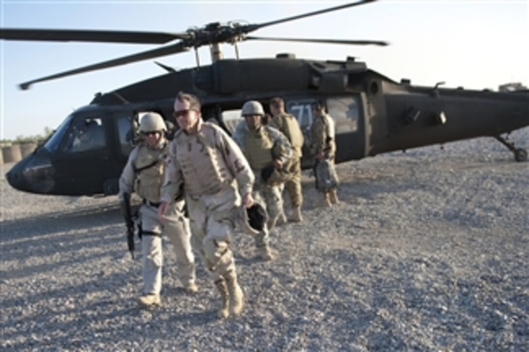 Chairman of the Joint Chiefs of Staff Adm. Mike Mullen, U.S. Navy, arrives at Forward Operating Base Jackson, Afghanistan, on April 19, 2011.  Mullen is in the Central Command area of operation supporting a USO tour to the region and visiting counterparts and service members stationed in the area.  