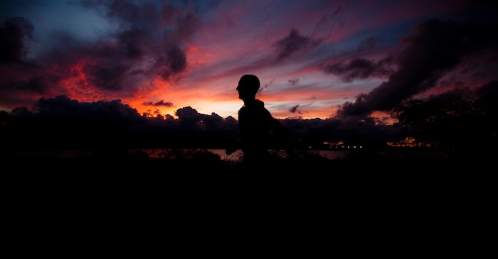 Staff Sgt. Tyler Hubbard, the substance abuse and control officer for Headquarters Battalion, Marine Corps Base Hawaii, runs along Nuupia Ponds Wildlife Management Area on base, April 19, 2011. Sincearriving in Hawaii in April 2010, Hubbard has won the Windward Half Marathon in Kailua last September, and the Turkey Trot 10-kilometer race here last November; placed third at the All-Marine Cross Country Championship in California in January; earned second among service members at the Great Aloha Run in Honolulu in February; and won The Beast 10-kilometer, and the Surf and Turf 5-kilometer races here in March and April.