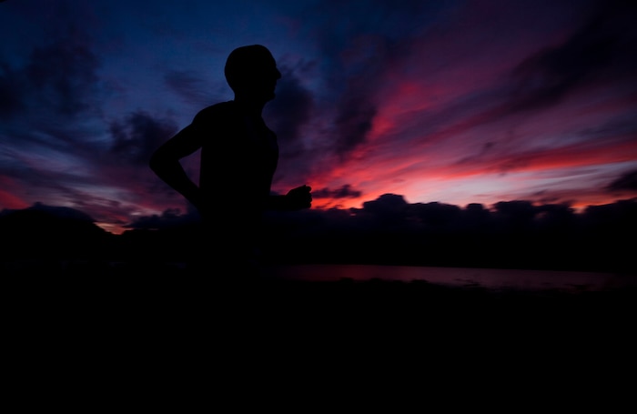 Staff Sgt. Tyler Hubbard, the substance abuse and control officer for Headquarters Battalion, Marine Corps Base Hawaii, runs along Nuupia Ponds Wildlife Management Area on base, April 19, 2011. Since arriving in Hawaii in April 2010, Hubbard has won the Windward Half Marathon in Kailua last September, and the Turkey Trot 10-kilometer race here last November; placed third at the All-Marine Cross Country Championship in California in January; earned second among service members at the Great Aloha Run in Honolulu in February; and won The Beast 10-kilometer, and the Surf and Turf 5-kilometer races here in March and April.
