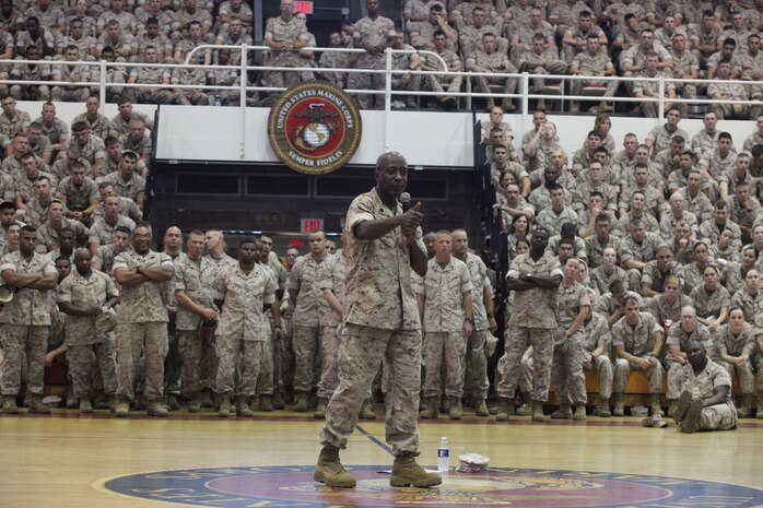 Sgt. Maj. Carlton Kent, 16th sergeant major of the Marine Corps, talks to more than 3,000 Marines at the Geottge Memorial Field House aboard Marine Corps Base Camp Lejeune, April 20. Camp Lejeune is just one of many stops he will be taking as he tours the country and talks to Marines for the last time as sergeant major of the Marine Corps.