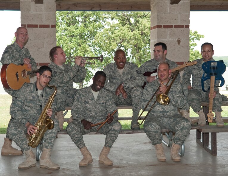 Eight members of the 531st Texas Air National Guard Band of the Gulf Coast, a Latin pop/rock group called 'Blue Hawk,' prepare to deploy to Southwest Asia this summer 2011. The band is providing troop morale and support throughout the Area of Operations in support of Enduring Freedom and New Dawn. (U.S. Air Force photo by Senior Master Sgt. Elizabeth Gilbert)
