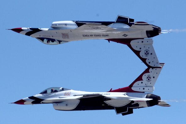 SEYMOUR JOHNSON AIR FORCE BASE, N.C. -- The U.S. Air Force Thunderbirds perform during the Wings Over Wayne Air Show and Open House here, April 17, 2011. The Thunderbirds were the headliners for the weekend, but rain and the threat of tornados halted Saturday's performance. Blue skies on Sunday made for great flying. (U.S. Air Force photo/Senior Airman Rae Perry) (RELEASED)