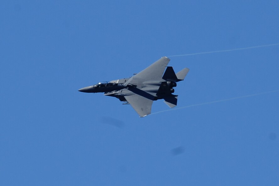 SEYMOUR JOHNSON AIR FORCE BASE, N.C. -- An F-15E Strike Eagle performs a flyover during the opening ceremonies for the Wings Over Wayne Air Show and Open House April 16, 2011. (U.S. Air Force photo/Senior Airman Rae Perry) (RELEASED)