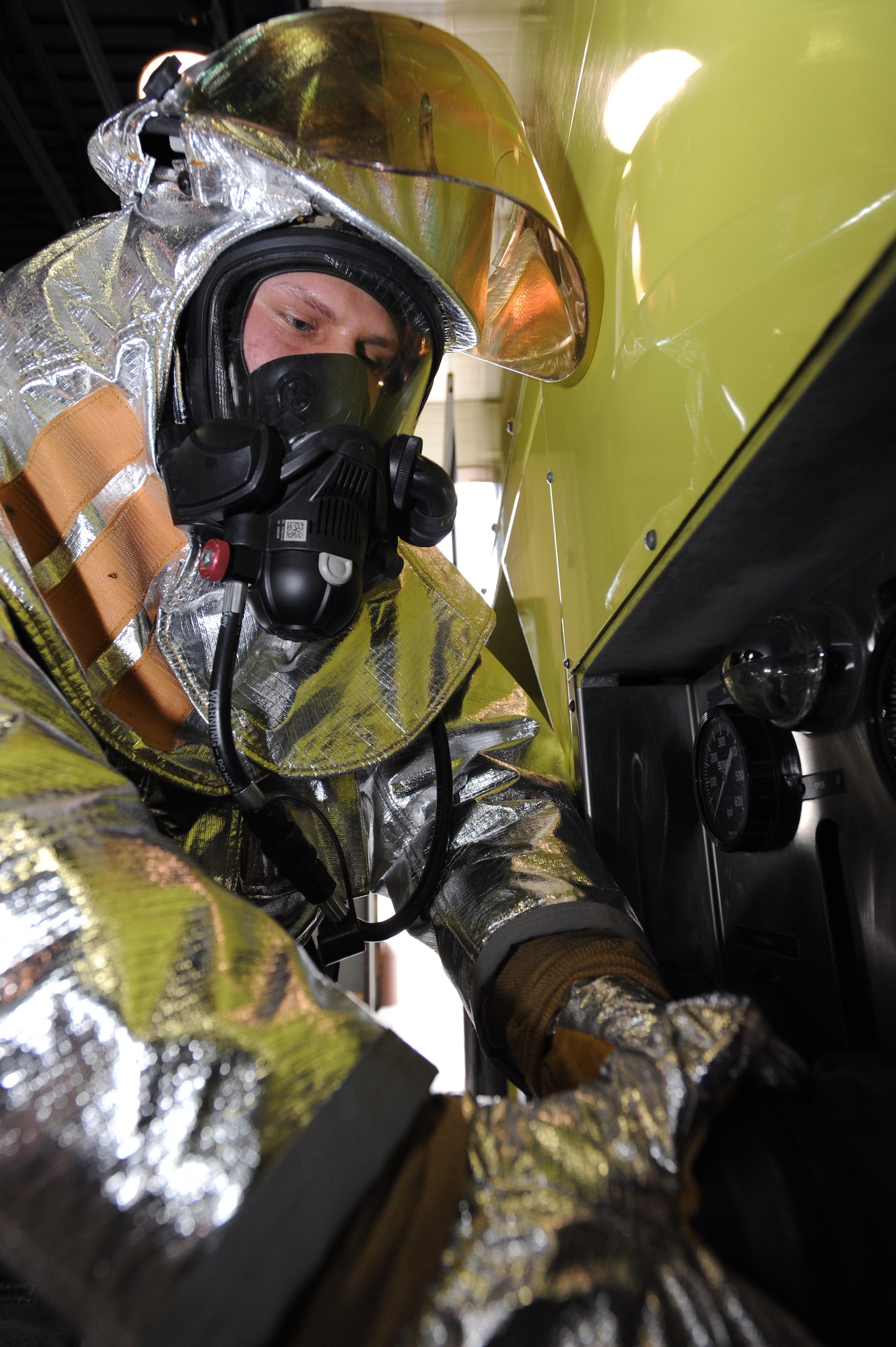 Airman 1st Class Shane Holland, 319th Civil Engineering Squadron firefighter, works during an exercise Apr. 20 on Grand Forks Air Force Base. Airman Holland is the Warrior of the Week from Apr. 21 through 28. Warrior of the Week recognizes everyday Airmen working their every day jobs. (U.S. Air Force photo by Airman 1st Class Amber Bennett)