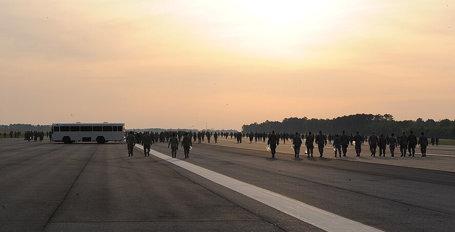 SEYMOUR JOHNSON AIR FORCE BASE, N.C. -- Members of the 4th Fighter Wing clean foreign objects and debris from the flightline following the Wings Over Wayne Air Show and Open House April 18, 2011. (U.S. Air Force photo/Senior Airman Gino Reyes) (RELEASED)