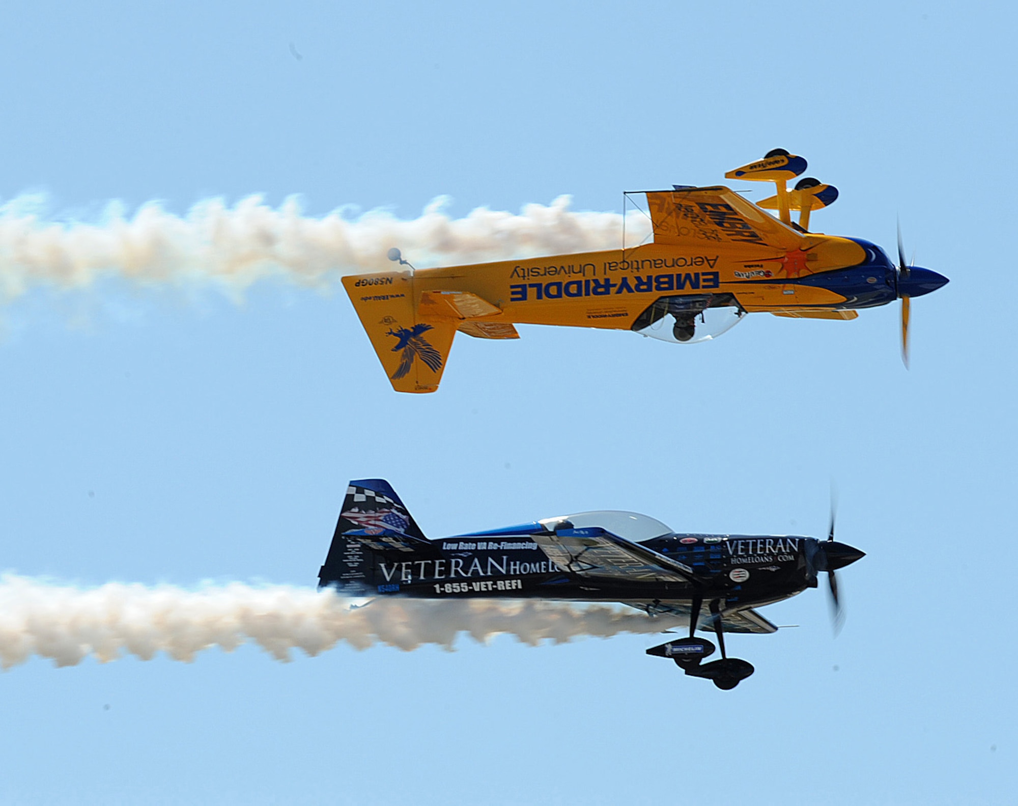 SEYMOUR JOHNSON AIR FORCE, N.C. -- Aerial performers Matt Chapman and Rob Holland show off their stunts during the Wings Over Wayne Air Show and Open House April 17, 2011. (U.S. Air Force photo/Senior Airman Gino Reyes) (RELEASED)