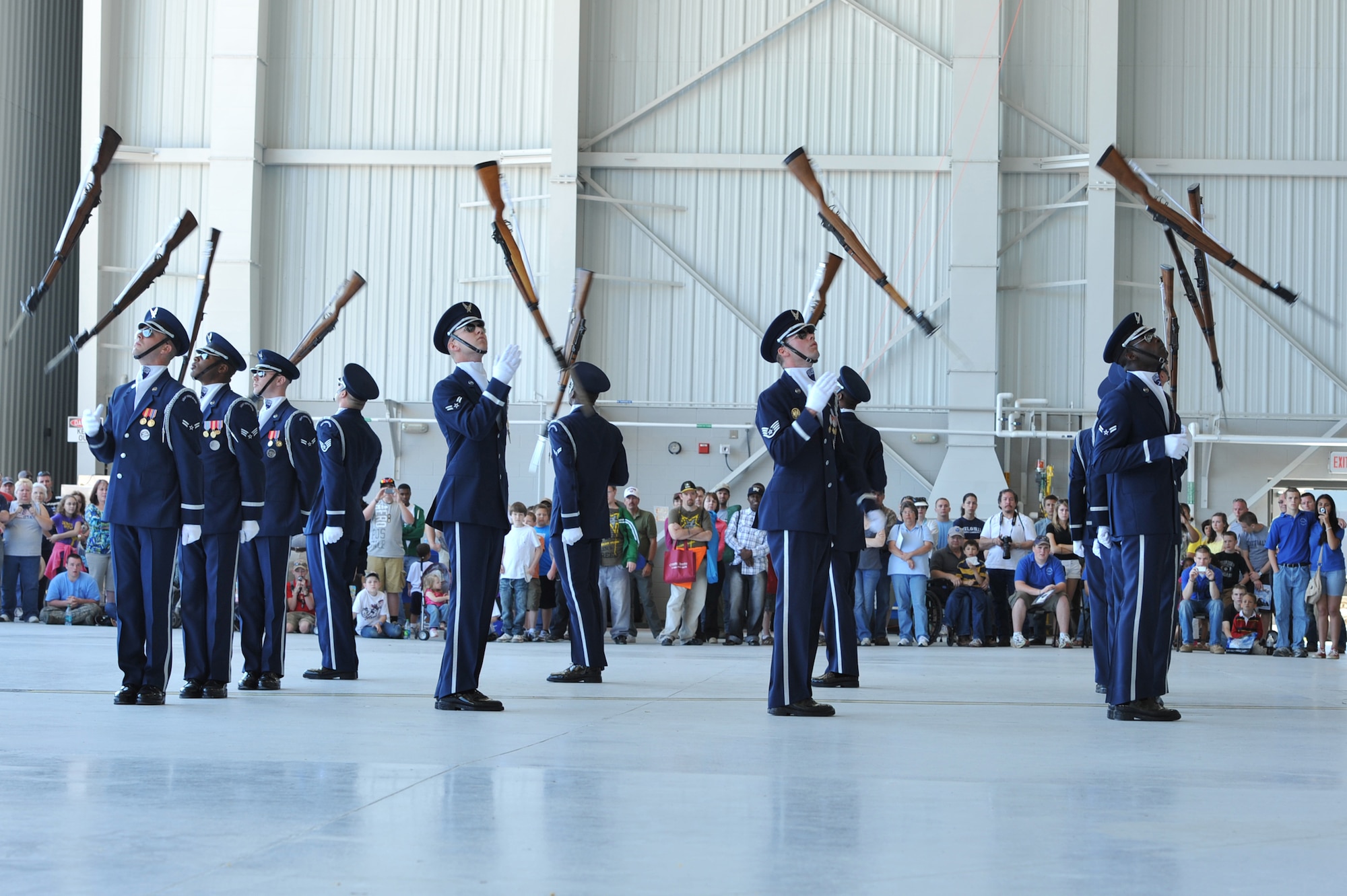 SEYMOUR JOHNSON AIR FORCE BASE, N.C. -- Airmen from the U.S. Air Force Honor Guard drill team perform during the Wings Over Wayne Air Show and Open House here, April 17, 2011. The honor guard's mission is to represent Airmen to the American and international public. (U.S. Air Force photo/Senior Airman Whitney Lambert) (RELEASED)