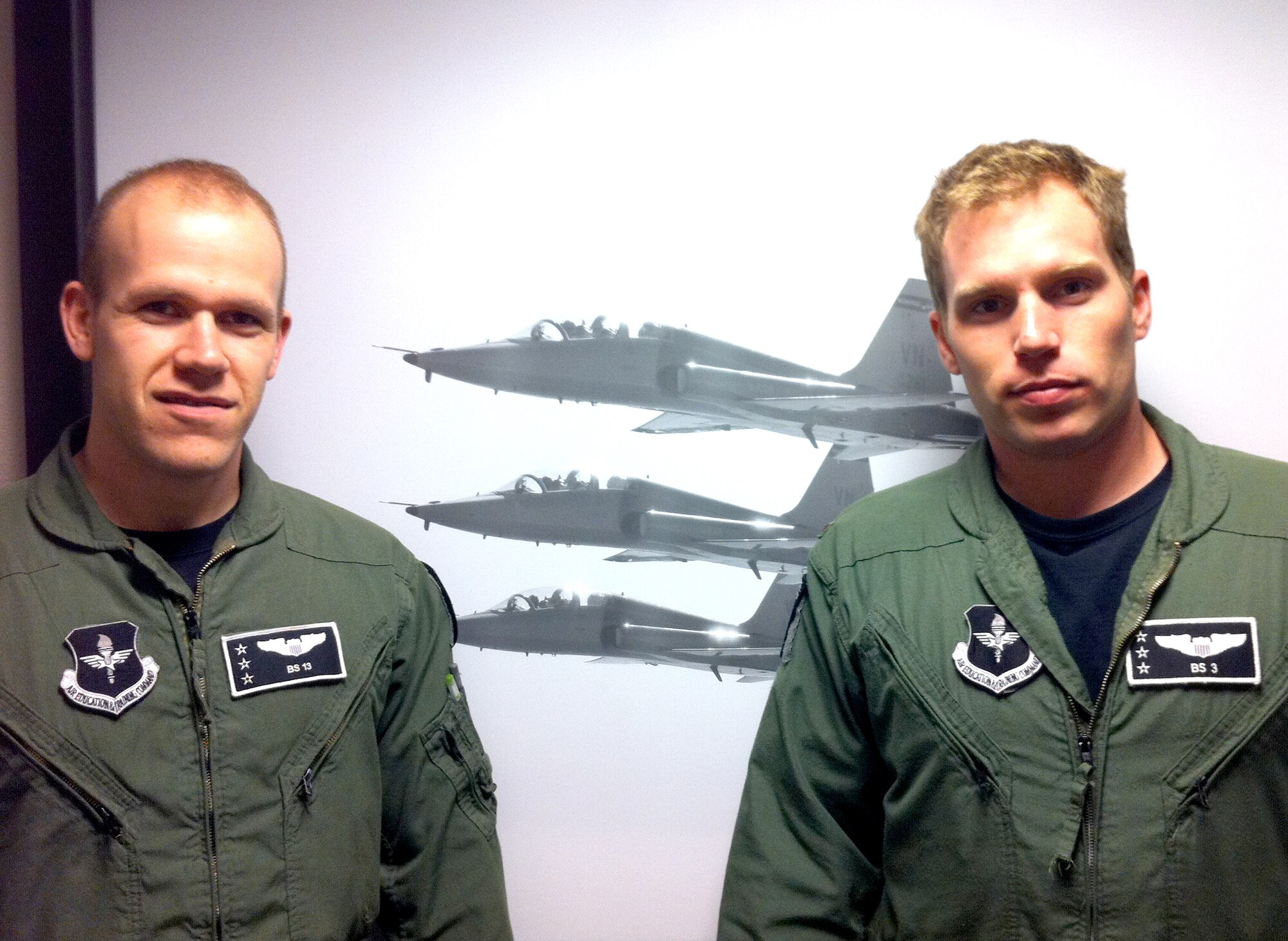 Second Lt. Matt Kading, left, and 2nd Lt. Don Davis, graduated from Introduction to Fighter Fundamentals Class 11-FBV, April 14, at Vance AFB, Okla. (U.S. Air Force photo)